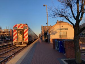 Metra train pulls into the station in northwest suburban Mount Prospect at sunset