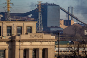 Gary indiana steel works facility. Dark building with smoke surrounding