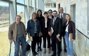ELPC Staff Attorney Katie Garvey stands with farmers and partners from Iowa Farmers Union, Iowa Environmental Council, Dakota Rural Action, and Food & Water Watch before a hearing in Iowa on the Swampbuster provision of the Farm Bill